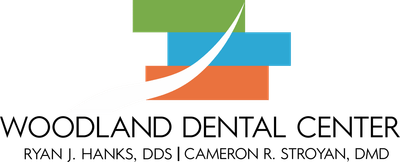 Woodland Dental Center logo
