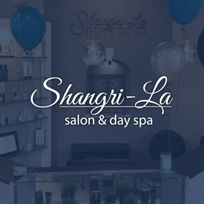 Shangri-La Salon and Day Spa logo