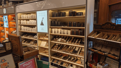 Smoky's Fine Cigars logo