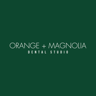 Orange and Magnolia Dental Studio logo